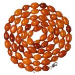 A NECKLACE OF 68 AMBER BEADS 115.6g ++++