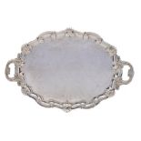 A VICTORIAN SILVER TEA TRAY 66.5cm over handles, by John Round & Son Ltd, London 1895 and marked for