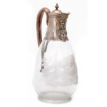 A VICTORIAN SILVER MOUNTED GLASS CLARET JUG with mask lip, the body engraved with a fox, 24.5cm h,