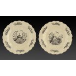 A PAIR OF CREAMWARE FEATHER MOULDED PLATES, 19TH C transfer printed in black with fancy birds, 22.