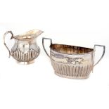 A VICTORIAN SILVER CREAM JUG AND A SIMILAR SUGAR BOWL jug 10cm h, by Willian Hutton & Sons, London