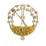 A DIAMOND BROOCH, 1983 with diamond collets of varying size in 18ct textured and openwork gold,