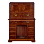 COLONIAL FURNITURE. A DOCUMENTARY JAMAICAN MAHOGANY FREE STANDING WRITING CABINET, DATED 1828 in two