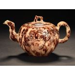 A STAFFORDSHIRE TORTOISESHELL GLAZED CREAMWARE GLOBULAR TEAPOT AND COVER, C1760 with crabstock