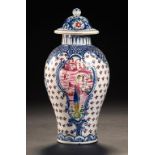 A PEARLWARE BALUSTER VASE AND COVER, C1780 painted in blue and polychrome, the vase with a Long