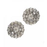 A PAIR OF DIAMOND CLUSTER EARRINGS with larger central old cut diamond, mounted in white gold, 1.6cm