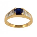 A STYLISH SAPPHIRE AND DIAMOND RING the oval sapphire between graduated shoulders of baguette cut