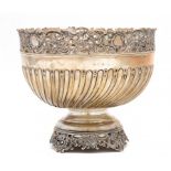 A VICTORIAN SILVER ROSE BOWL with pierced rim, spirally lobed and fluted, 16cm h, marks rubbed,