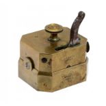 MEDICAL. A BRASS SCARIFICATOR BY EVANS, LONDON, C1840 with steel hammer shooting ten blades, 6cm