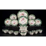 A JOHN RIDGWAY GREEN GROUND TEA SERVICE, C1825 painted with a loose bouquet and scattered flowers,