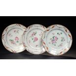 A SET OF THREE CHINESE EXPORT PORCELAIN FAMILLE ROSE PLATES, C1770 23cm diam ++Several tiny rim