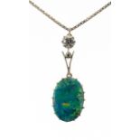 A BLACK OPAL AND DIAMOND PENDANT in gold, the opal approximately 1.1 x 1.6cm on a white gold necklet