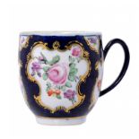 A RARE DERBY SCALE BLUE GROUND COFFEE CUP, C1780 closely imitating a Worcester original and