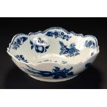 A CAUGHLEY MOULDED BLUE AND WHITE PINE CONE PATTERN SALAD BOWL, C1770-90 25.5cm diam, incised S,