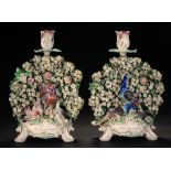 A PAIR OF DERBY AESOP'S FABLE CANDLESTICKS OF THE VAIN JACKDAW AND THE COCK AND JEWELL, C1770 the