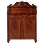 A GEORGE IV MAHOGANY CHIFFONIER, C1830 the swan neck back with applied roundels, 33cm h; 38 x