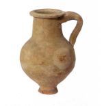 AN ANCIENT EASTERN MEDITERRANEAN POTTERY JUG, C1000-500BC 10.5cm h Provenance: An English private