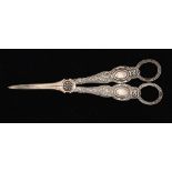 A PAIR OF VICTORIAN SILVER GRAPE SHEARS of Ornamental Elizabethan pattern, by Francis Higgins,