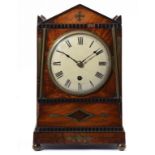 A REGENCY BRASS INLAID MAHOGANY AND EBONY MANTLE TIMEPIECE, C1820 with painted dial and pierced