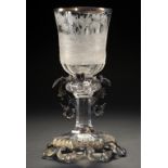 A GERMAN SILVER GILT MOUNTED ENGRAVED GLASS GOBLET, C1850 the bell shaped bowl engraved with a