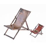 TWO UNUSUAL MINIATURE SILVER WORKING MODEL DECK-CHAIRS 4.5 and 10cm h, one maker JRF, London 1979,