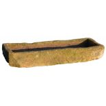 AN ENGLISH SANDSTONE TROUGH, 19TH C with drain hole at one end, 23cm h approx; 64 x 165cm ++
