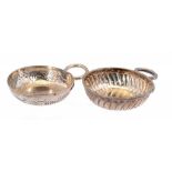 TWO FRENCH SILVER WINE TASTERS the bowl of one inset with an half Ecu 1650, bowl 7.3cm diam, post