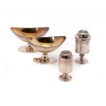 TWO GEORGE III CYLINDRICAL SILVER PEPPER CASTERS AND COVERS 7.5 & 8.5cm h, marked on side and cover,