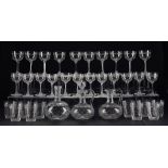 AN ENGLISH CUT AND ENGRAVED GLASS SUITE, C1900 including a pair of jugs 15cm h (37) ++The lot in