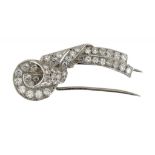 A DIAMOND BROOCH, MID 20TH C of scarf design, in white gold, 4cm l, 7.1g ++In fine condition