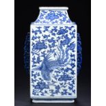 A CHINESE BLUE AND WHITE DRAGON AND PHOENIX VASE, 18TH-19TH CENTURY of rectangular section, the