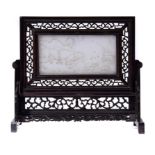 A CHINESE CARVED WOOD TABLE SCREEN WITH WHITE JADE PANEL, 20TH C the panel carved with a carp, the