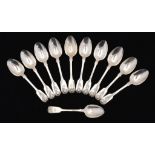 A SET OF ELEVEN VICTORIAN SILVER DESSERT SPOONS Fiddle & Shell pattern, crested, by A B Savory &