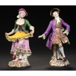 A PAIR OF MINTON FIGURES OF DANCERS, C1840 painted in bright enamels on scrolling gilt base, 19cm