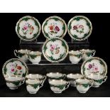 A SET OF SIX HICKS & MEIGH GREEN GROUND TEA AND COFFEE CUPS AND SAUCERS, C1825 painted with flowers,