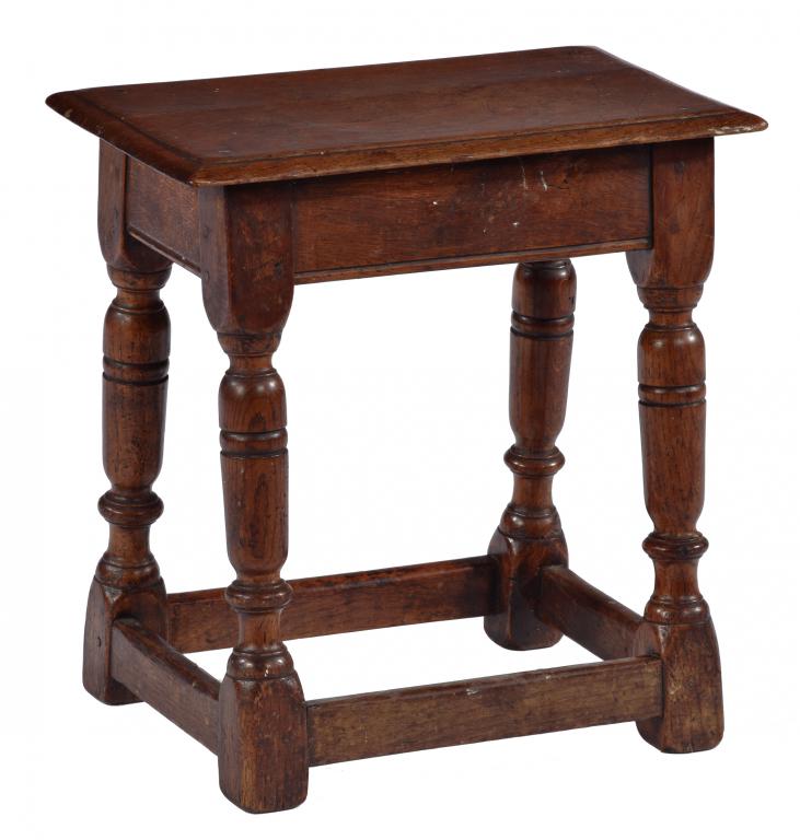 AN OAK JOINED STOOL, LATE 17TH C with moulded rails and turned legs, 46cm h; 27 x 44cm ++A genuine