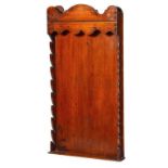 TREEN. A BRITISH STAINED WOOD WALL HANGING CLAY PIPE RACK, FIRST HALF 19TH C for churchwarden pipes,