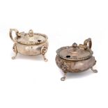 A PAIR OF GEORGE VI SILVER MUSTARD POTS on lion mask feet, 6cm h, by Nayler Brothers, London 1948,