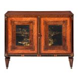 A DUTCH MAHOGANY, SATINWOOD, INLAID AND JAPANNED COMMODE, C1800 applied with brass rosettes, on