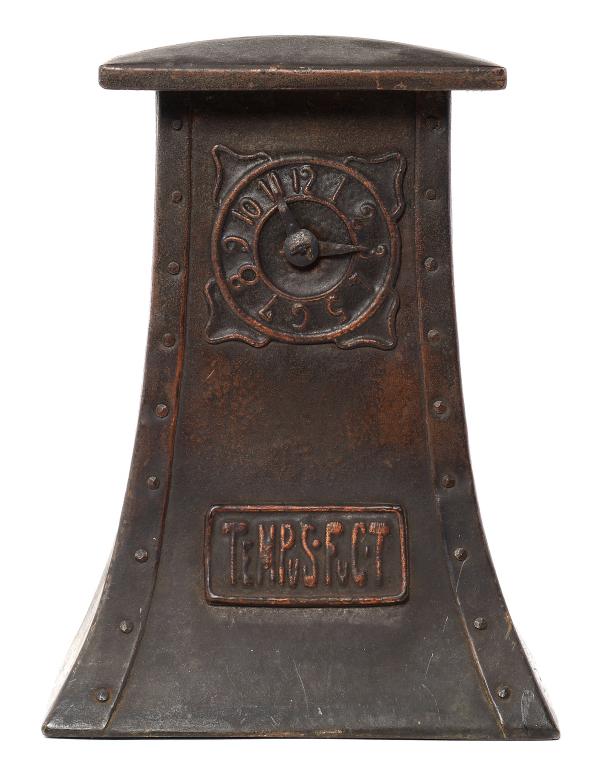 AN ARTS & CRAFTS COPPER CLOCK ATTRIBUTED TO ERNEST SPITTLE, C1900 of flared shape embossed TEMPUS