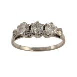 A DIAMOND THREE STONE RING in white gold with open shoulders, 2.4g, size J ++In good second hand