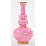 A MINTONS BONE CHINA PINK GROUND TRIPLE GOURD VASE THE SHAPE ATTRIBUTED TO DR CHRISTOPHER DRESSER,