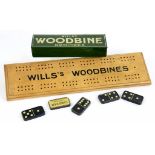 A WILLS WOODBINE DOMINOES TIN CONTAINING A SET OF LITHOGRAPHED TIN DOMINOES AND A WILLS WOODBINE