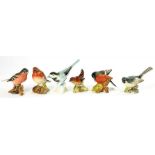 FIVE BESWICK EARTHENWARE MODELS OF BIRDS, COMPRISING ROBIN, BULLFINCH, WREN, GREY WAGTAIL AND