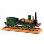 SCRATCH BUILT MODEL OF THE SUNBEAM STEAM ENGINE WITH TENDER ALL WITHIN A PERSPEX CASE, 58CM L