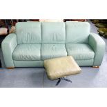 A PALE GREEN LEATHER THREE SEAT SOFA, 225CM W AND A 1970'S LEATHER STOOL ON CHROMIUM PLATED SUPPORT