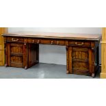 A VICTORIAN REFORMED GOTHIC OAK SIDEBOARD WITH SUBSTANTIAL BRASS HANDLES, 234CM W