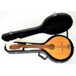 A CASED FLAT BACKED MANDOLA, CARD SHELL CASE