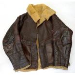 A WORLD WAR TWO PILOT'S SHEEPSKIN LINED LEATHER FLYING JACKET, ZIP MARKED AREO, C1940, LOSSES AND