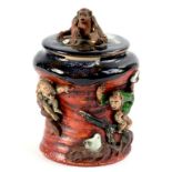 A JAPANESE SUMIDA WARE TOBACCO JAR AND COVER WITH SEATED MONKEY FINIAL, 15CM H, EARLY 20TH C